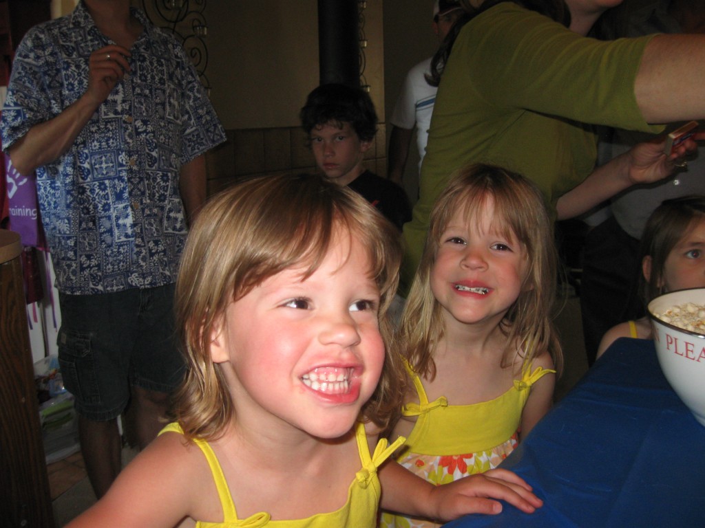 Rylee & Haylee getting ready to blow out their candles.